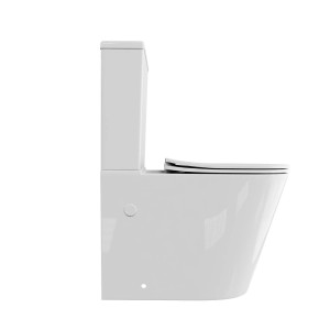 Białe kompaktowe WC t.b.t. ze spłuczką, widok z boku.