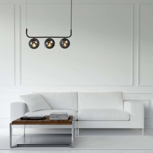 Nowoczesna lampa wisząca z trzema szarymi szklanymi kulami do stylowego oświetlenia salonu.