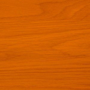 Zbliżenie pomarańczowej powierzchni drewna, idealne do ochrony i gruntowania drewna.