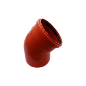 Pomarańczowe kolanko t.b.t. do rur gruntowych.