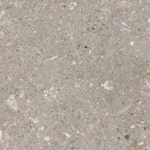 Szara płytka podłogowa z nakrapianą powierzchnią.