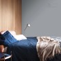 Ściana sypialni pomalowana w odcieniu t.b.t. Kolorowe farby do ścian.