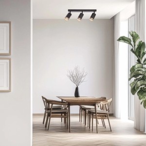 Czarna listwa świetlna LED t.b.t. z trzema reflektorami w nowoczesnej jadalni.
