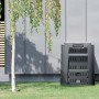Czarny kompostownik Compogreen 210 l do recyklingu odpadów ogrodowych na zewnątrz.