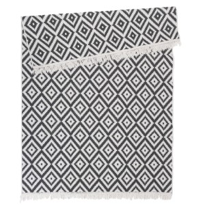 t.b.t. Dywan z krótkim włosiem z graficznym wzorem w romby w kolorze czarno-białym.