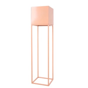 Różowy stojak na kwiaty z kwadratową doniczką do roślin domowych.