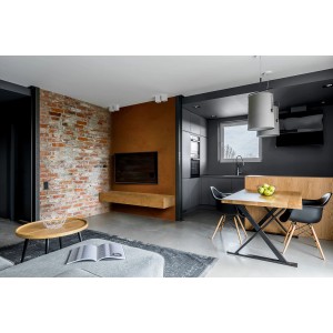 Nowoczesny salon z farbą efektową na ścianie i jadalnią.