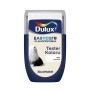 Tester farby Dulux Easycare w kolorze niebieskim z próbką koloru "Sita wanilii".