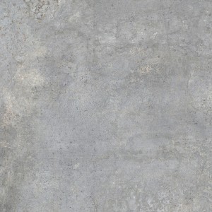 Szara płytka podłogowa t.b.t. o matowym wykończeniu.