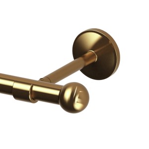 Złoty karnisz t.b.t. z końcówką i mocowaniem ściennym.