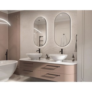 Nowoczesna łazienka z dwoma owalnymi lustrami i umywalkami.