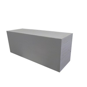 Szary bloczek z betonu komórkowego. Lekki bloczek betonowy do budowy.