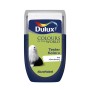 Tester koloru Dulux „Las Równikowy“: Niebiesko-zielony wałek do farb ściennych z psem.