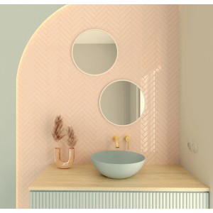 Nowoczesna łazienka z dwoma okrągłymi lustrami i umywalką nablatową. Lustra.