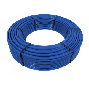 Niebieska rura grzewcza t.b.t. zwinięta i zabezpieczona czarnymi opaskami kablowymi.