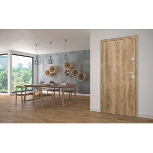 Drzwi wewnętrzne t.b.t. w kolorze drewna w aranżacji wnętrza.