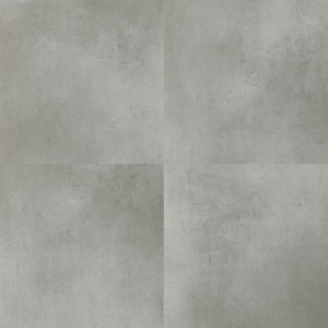 Szare panele winylowe t.b.t. o wyglądzie betonu do użytku wewnętrznego.