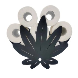 Uchwyt na papier toaletowy w kształcie liścia, część zestawu akcesoriów łazienkowych.
