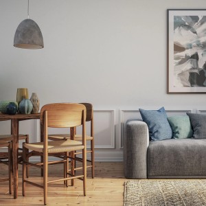 Pokój dzienny ze stołem, krzesłami, sofą i dekoracjami. Inspiracja kolorami ścian.