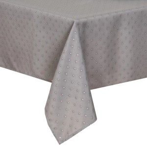 Szary obrus w kropki, idealny na stół w jadalni.