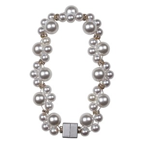 Dekoracyjny karnisz t.b.t. z białymi perłami do dekoracji okien.