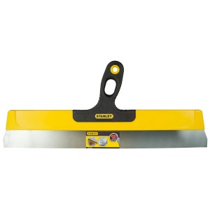 Żółta szpachla do gładzi firmy Stanley, narzędzie murarskie i glazurnicze.
