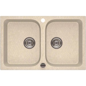 Beżowy zlewozmywak granitowy t.b.t. z dwiema komorami i armaturą odpływową.