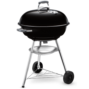 Czarny grill węglowy Weber Compact Kettle Ø 57 cm z pokrywą i popielnikiem.
