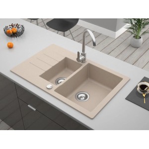 Beżowy zlewozmywak granitowy t.b.t. z dwiema komorami i ociekaczem.