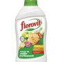 Nawóz płynny Florovit do roślin kwitnących w białej butelce z zieloną nakrętką.