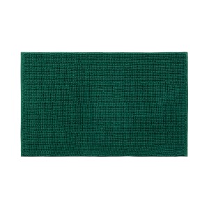 Zielona mata łazienkowa o teksturowanej powierzchni.