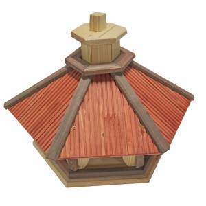 Drewniany karmnik dla ptaków z czerwonym dachem do ogrodu.