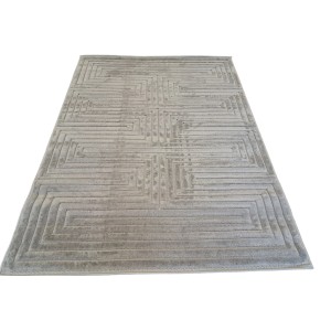 Szary dywan z krótkim włosiem i geometrycznym wzorem. Idealny do salonu.
