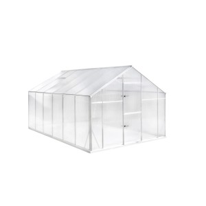 Jasna szklarnia t.b.t. z przezroczystymi ścianami i dachem.