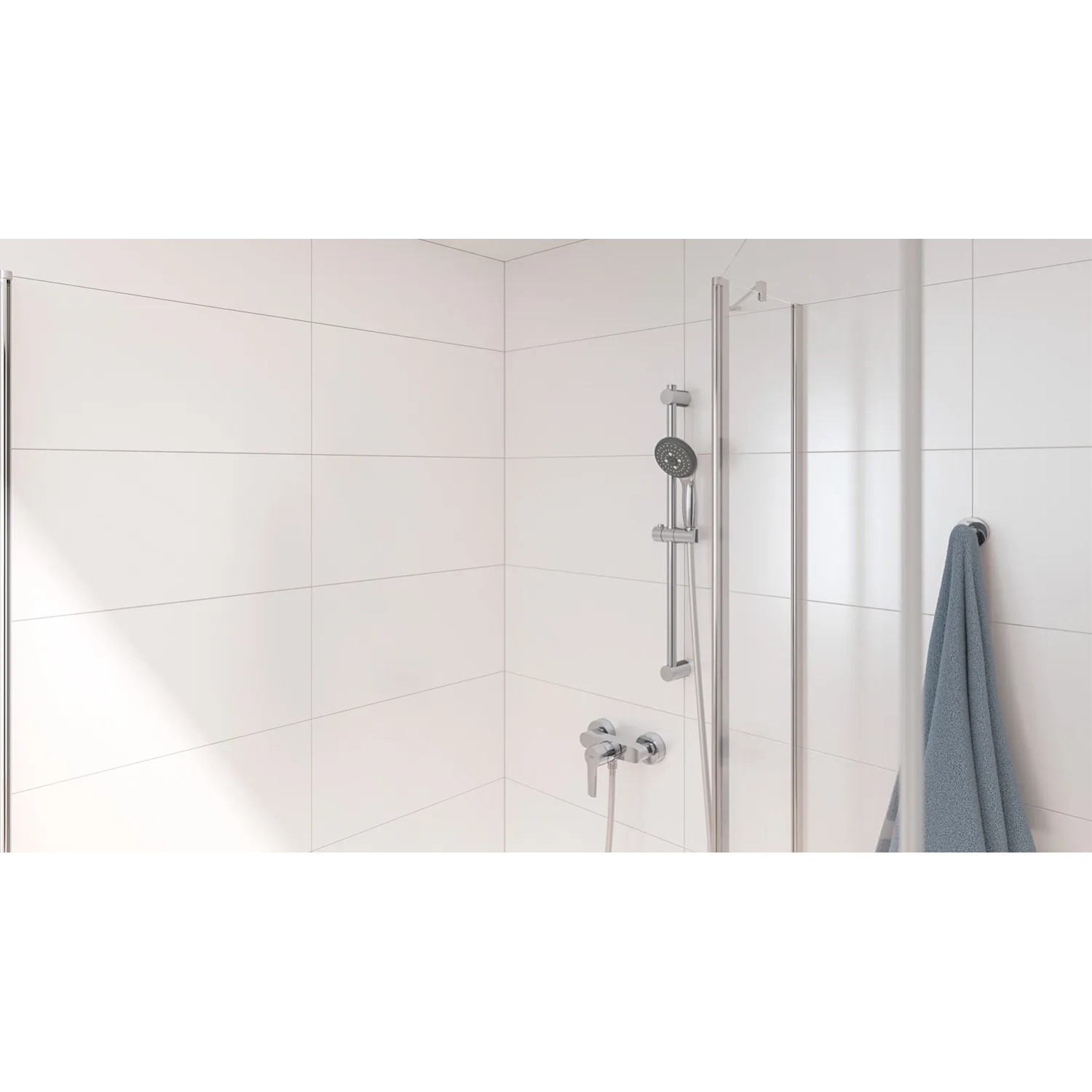Bateria prysznicowa Grohe QuickFix Start do montażu ściennego, chromowana, w strefie prysznica.