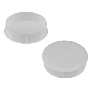 Białe zaślepki do śrub meblowych t.b.t., dwa różne widoki.