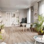 Jasny salon z zamontowanymi panelami winylowymi. Przytulna atmosfera.