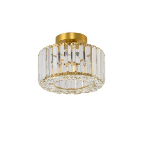 Elegancka lampa wisząca t.b.t. z kryształowym szkłem i złotą podstawą.