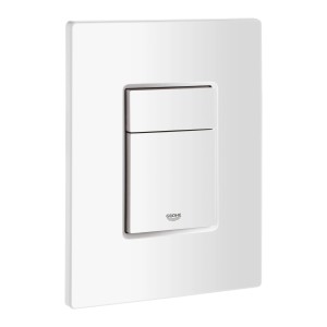 Biały przycisk spłukujący do WC, część zestawu WC.