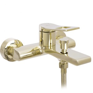 Złota bateria wannowa t.b.t. z wężem prysznicowym.