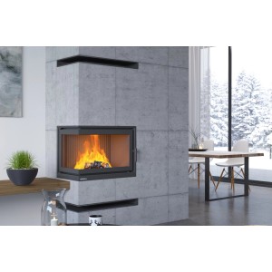 Kominek z paleniskiem w nowoczesnym salonie. Kominek jest osadzony w szarej betonowej ścianie.