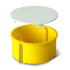 Żółta puszka podtynkowa z białą pokrywką. Idealna do instalacji elektrycznych.