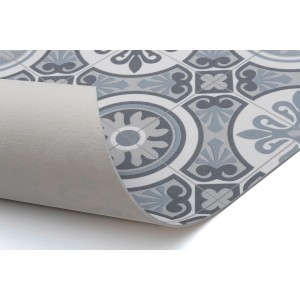 t.b.t. Wykładzina podłogowa PCV ze wzorem płytek w kolorze szarym i białym.