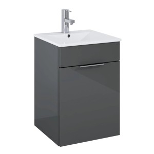 Szara szafka pod umywalkę t.b.t. z umywalką i baterią do łazienki.