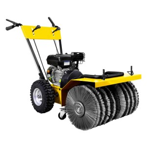 Żółta zamiatarka t.b.t. z silnikiem i obrotowymi szczotkami do czyszczenia powierzchni.