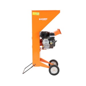 Pomarańczowy rozdrabniacz ogrodowy Handy Prime, widok z boku. Elektryczny rozdrabniacz ogrodowy z kołami.