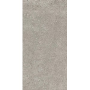 Szara płytka podłogowa t.b.t. o matowym wykończeniu.