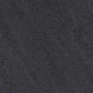 Ciemnoszara płytka podłogowa t.b.t. o matowym wykończeniu.