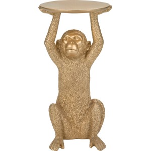 Złota małpa jako świecznik. Dekoracyjny świecznik dla nastrojowego światła.