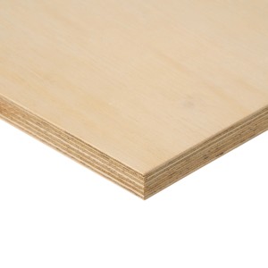 Jasna płyta drewniana, zbliżenie krawędzi. Konstrukcje i produkcja mebli.